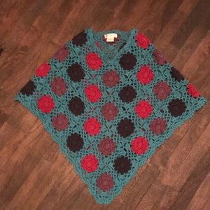 Crocheted poncho.